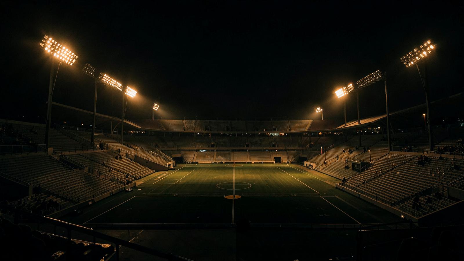 Atmospheric stadium lights at night